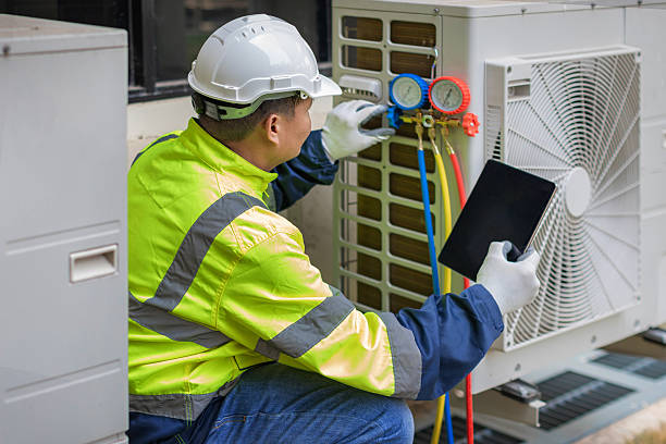 Professional Hvac Maintenance technician working in Trezevant, TN